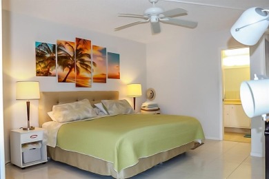 Enjoy South Florida living with this 2Bed/2Bath second floor on Hillsboro Pines Golf in Florida - for sale on GolfHomes.com, golf home, golf lot