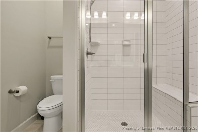 STUNNING low maintenance 4 bedroom, 2.5 bathroom end unit on Anderson Creek Golf Club in North Carolina - for sale on GolfHomes.com, golf home, golf lot