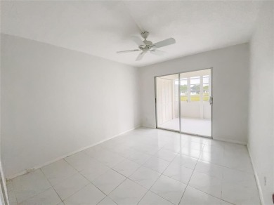 Enjoy South Florida living with this 2Bed/2Bath second floor on Hillsboro Pines Golf in Florida - for sale on GolfHomes.com, golf home, golf lot