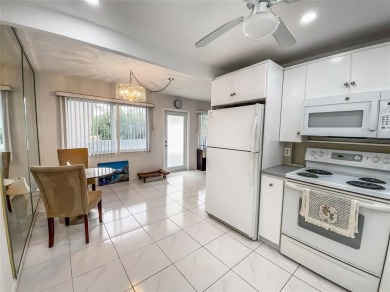 Enjoy South Florida living with this 2Bed/2Bath second floor on Hillsboro Pines Golf in Florida - for sale on GolfHomes.com, golf home, golf lot