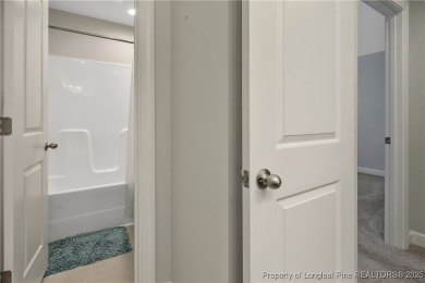 STUNNING low maintenance 4 bedroom, 2.5 bathroom end unit on Anderson Creek Golf Club in North Carolina - for sale on GolfHomes.com, golf home, golf lot