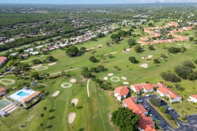 Enjoy peaceful views of the 14th fairway at Miles Grant Golf on Miles Grant Country Club in Florida - for sale on GolfHomes.com, golf home, golf lot
