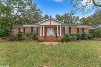 This beautifully updated 4 Bedroom 2 Bath Brick Home has a new on Lake Forest Yacht and Country Club in Alabama - for sale on GolfHomes.com, golf home, golf lot