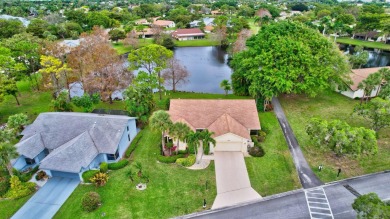 Magnificent lake view 2 bedroom, 2 bathroom, 2 car garage home on Boca Delray Golf and Country Club in Florida - for sale on GolfHomes.com, golf home, golf lot