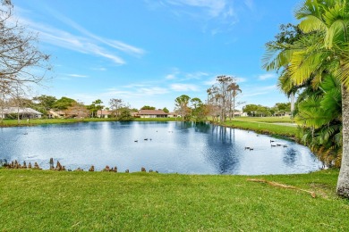 Magnificent lake view 2 bedroom, 2 bathroom, 2 car garage home on Boca Delray Golf and Country Club in Florida - for sale on GolfHomes.com, golf home, golf lot