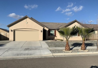 This lovely 4 bed, 2 bath home is located within the Lemoore on Lemoore Municipal Golf Course in California - for sale on GolfHomes.com, golf home, golf lot