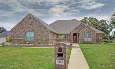 Nestled along the fairway of Holiday Hills Golf Course, this on Holiday Hills Country Club in Texas - for sale on GolfHomes.com, golf home, golf lot