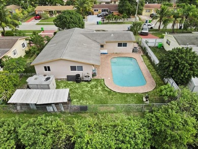 Welcome home, to your spacious 4-bedroom, 2-bath pool home in on Sunrise Country Club in Florida - for sale on GolfHomes.com, golf home, golf lot