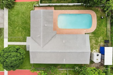 Welcome home, to your spacious 4-bedroom, 2-bath pool home in on Sunrise Country Club in Florida - for sale on GolfHomes.com, golf home, golf lot