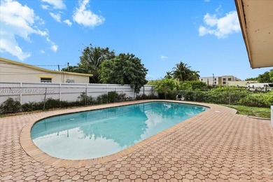 Welcome home, to your spacious 4-bedroom, 2-bath pool home in on Sunrise Country Club in Florida - for sale on GolfHomes.com, golf home, golf lot