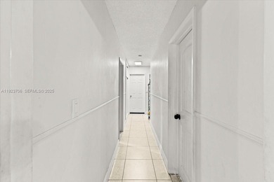 Welcome home, to your spacious 4-bedroom, 2-bath pool home in on Sunrise Country Club in Florida - for sale on GolfHomes.com, golf home, golf lot