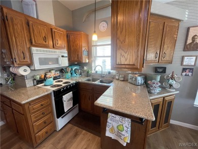 Great Active Community. Delightful Kitchen and casual dining on Riverview Golf Course in Arizona - for sale on GolfHomes.com, golf home, golf lot