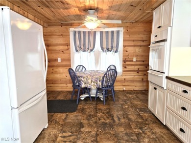 Welcome to this quaint, cape cod--nestled in a private Lake on The Harbor Golf Club in Ohio - for sale on GolfHomes.com, golf home, golf lot