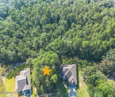 Excellent Wooded Lot in a highly desirable area. Deep property on Diamondhead Country Club in Mississippi - for sale on GolfHomes.com, golf home, golf lot