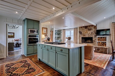 Nestled in the heart of High Hampton, this charming one-level on High Hampton Inn and Country Club in North Carolina - for sale on GolfHomes.com, golf home, golf lot