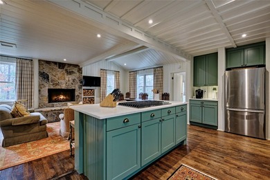 Nestled in the heart of High Hampton, this charming one-level on High Hampton Inn and Country Club in North Carolina - for sale on GolfHomes.com, golf home, golf lot