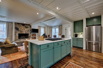 Nestled in the heart of High Hampton, this charming one-level on High Hampton Inn and Country Club in North Carolina - for sale on GolfHomes.com, golf home, golf lot