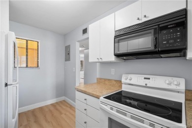 Situated in Port Salerno and in close proximity to downtown on Miles Grant Country Club in Florida - for sale on GolfHomes.com, golf home, golf lot
