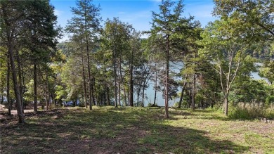 Lakefront living awaits! This .6-acre homesite offers the on Holiday Island Executive Golf Course in Arkansas - for sale on GolfHomes.com, golf home, golf lot
