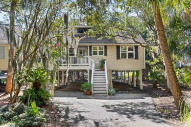 Nestled beneath the island's moss-draped live oaks and palms on The Seabrook Island Club in South Carolina - for sale on GolfHomes.com, golf home, golf lot