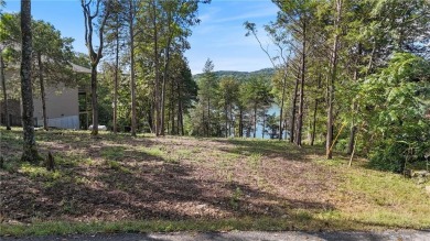 Lakefront living awaits! This .6-acre homesite offers the on Holiday Island Executive Golf Course in Arkansas - for sale on GolfHomes.com, golf home, golf lot