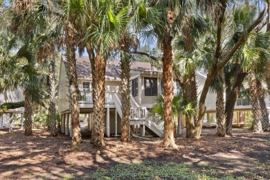 Nestled beneath the island's moss-draped live oaks and palms on The Seabrook Island Club in South Carolina - for sale on GolfHomes.com, golf home, golf lot