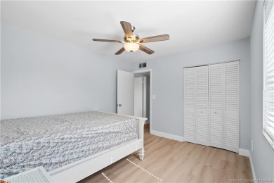 Situated in Port Salerno and in close proximity to downtown on Miles Grant Country Club in Florida - for sale on GolfHomes.com, golf home, golf lot