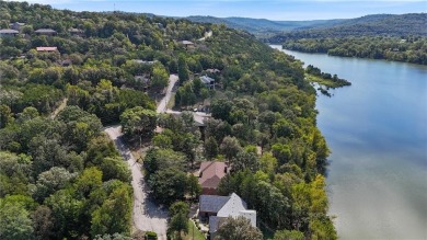 Lakefront living awaits! This .6-acre homesite offers the on Holiday Island Executive Golf Course in Arkansas - for sale on GolfHomes.com, golf home, golf lot