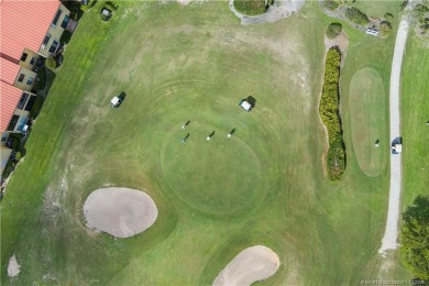 Situated in Port Salerno and in close proximity to downtown on Miles Grant Country Club in Florida - for sale on GolfHomes.com, golf home, golf lot