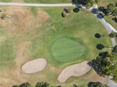 Situated in Port Salerno and in close proximity to downtown on Miles Grant Country Club in Florida - for sale on GolfHomes.com, golf home, golf lot