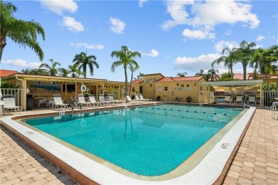 Situated in Port Salerno and in close proximity to downtown on Miles Grant Country Club in Florida - for sale on GolfHomes.com, golf home, golf lot