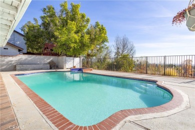 This beautiful home is nestled amidst gently rolling hills in on Knollwood Golf Club in California - for sale on GolfHomes.com, golf home, golf lot