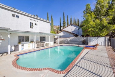 This beautiful home is nestled amidst gently rolling hills in on Knollwood Golf Club in California - for sale on GolfHomes.com, golf home, golf lot