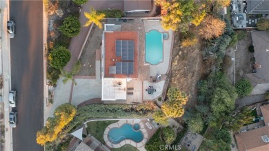 This beautiful home is nestled amidst gently rolling hills in on Knollwood Golf Club in California - for sale on GolfHomes.com, golf home, golf lot