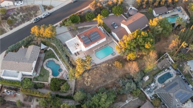 This beautiful home is nestled amidst gently rolling hills in on Knollwood Golf Club in California - for sale on GolfHomes.com, golf home, golf lot