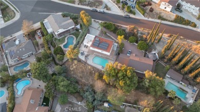 This beautiful home is nestled amidst gently rolling hills in on Knollwood Golf Club in California - for sale on GolfHomes.com, golf home, golf lot