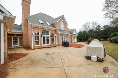 Classic elegance and Southern tradition are the hallmarks of on Jennings Mill Country Club in Georgia - for sale on GolfHomes.com, golf home, golf lot