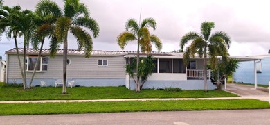 Well maintained 2/2 manufactured home, located on preferred on Cypress Creek Country Club - Boynton Beach in Florida - for sale on GolfHomes.com, golf home, golf lot
