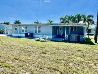 Well maintained manufactured home in active  age 55+ community on Cypress Creek Country Club - Boynton Beach in Florida - for sale on GolfHomes.com, golf home, golf lot