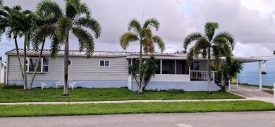 Well maintained manufactured home in active  age 55+ community on Cypress Creek Country Club - Boynton Beach in Florida - for sale on GolfHomes.com, golf home, golf lot