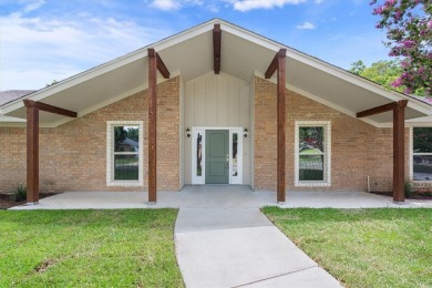 Welcome to your dream home in the heart of one of the city's on The Lake Country Club - Lake Waco in Texas - for sale on GolfHomes.com, golf home, golf lot