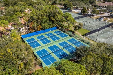 This second-floor, two-bedroom, two-bathroom condominium in East on East Lake Woodlands Country Club in Florida - for sale on GolfHomes.com, golf home, golf lot