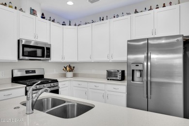 Find your living on island time dream in  this beautiful, open on LPGA International Golf Course in Florida - for sale on GolfHomes.com, golf home, golf lot