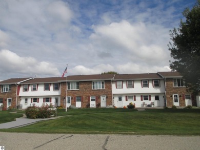 Well maintained 2 story condominium unit w/ full basement at on The Pines Golf Course at Lake Isabella in Michigan - for sale on GolfHomes.com, golf home, golf lot