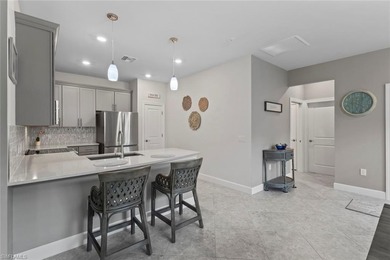 This IMMACULATE KENDRICK VILLA offers a peaceful PRESERVE VIEW on Panther Run Golf Club in Florida - for sale on GolfHomes.com, golf home, golf lot