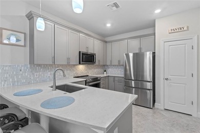 This IMMACULATE KENDRICK VILLA offers a peaceful PRESERVE VIEW on Panther Run Golf Club in Florida - for sale on GolfHomes.com, golf home, golf lot