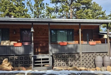 Charming 1 bedroom / 1 bathroom condo unit with a covered 90 sq on Estes Park Golf Course in Colorado - for sale on GolfHomes.com, golf home, golf lot