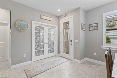 This IMMACULATE KENDRICK VILLA offers a peaceful PRESERVE VIEW on Panther Run Golf Club in Florida - for sale on GolfHomes.com, golf home, golf lot