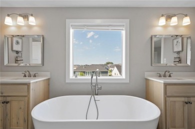 This Hillcrest Sport, constructed by Hanson, is the residence on Sundance Golf and Bowl in Minnesota - for sale on GolfHomes.com, golf home, golf lot