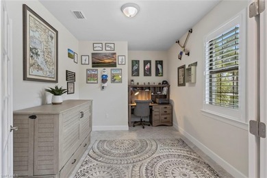 This IMMACULATE KENDRICK VILLA offers a peaceful PRESERVE VIEW on Panther Run Golf Club in Florida - for sale on GolfHomes.com, golf home, golf lot